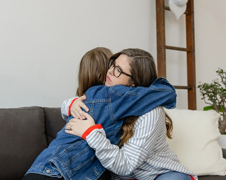 MomCo Moms hugging